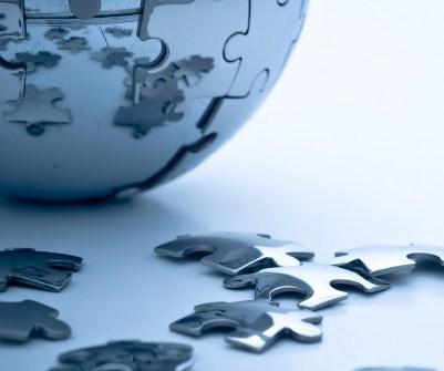 Global puzzle sphere representing strategy